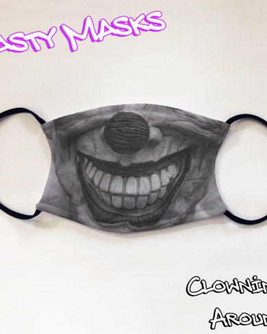 Facemask of scary clown face grinning in black & white