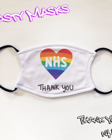 Facemask design white background with rainbow-coloured heart in centre, NHS in white across the centre of the heart and black text below stating 'thank you'